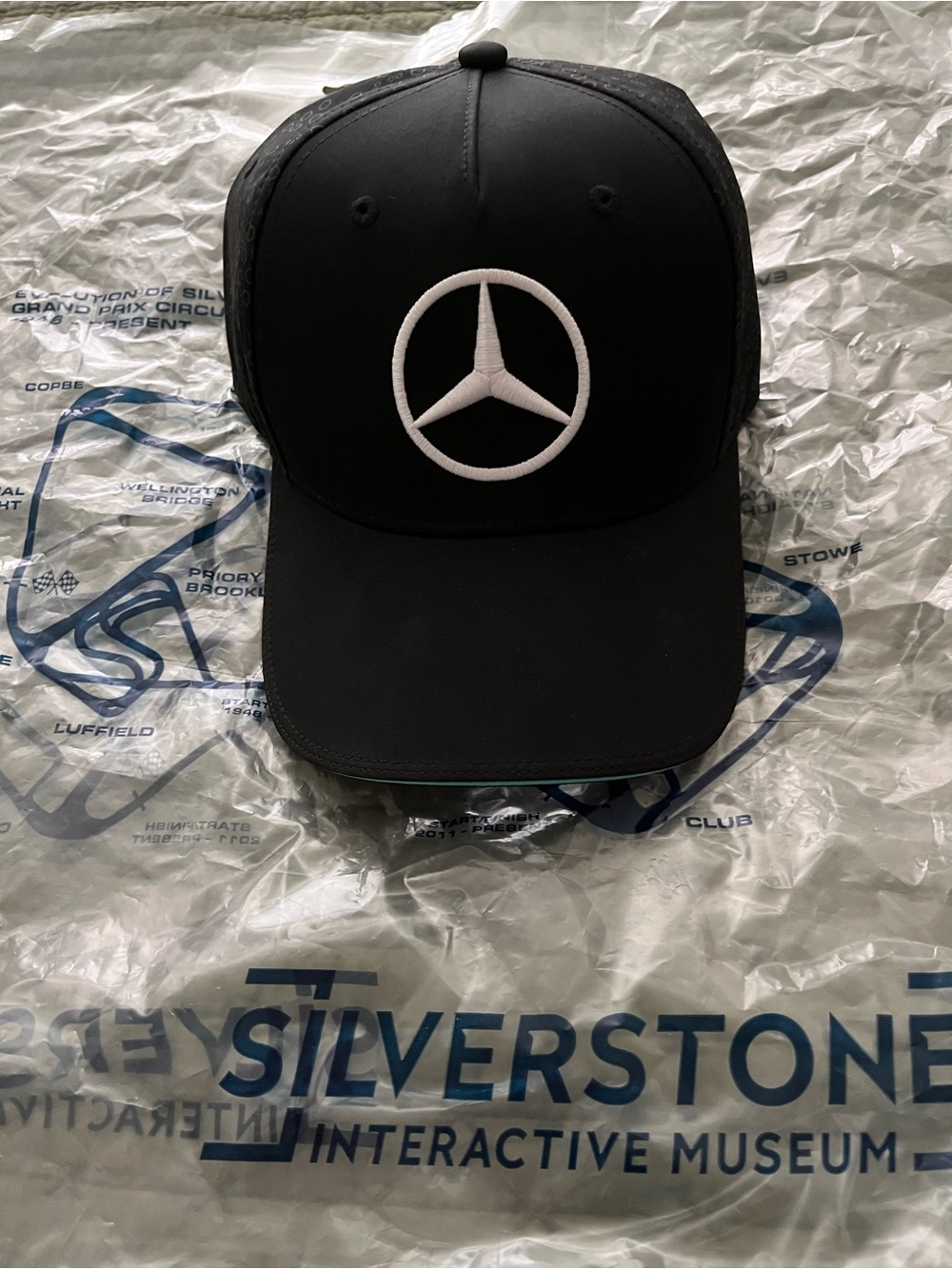Mercedes-Benz baseball cap. 
AMG Petronas Formula One team merchandise.